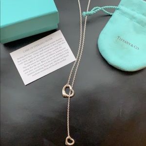 Tiffany’s open heart necklace